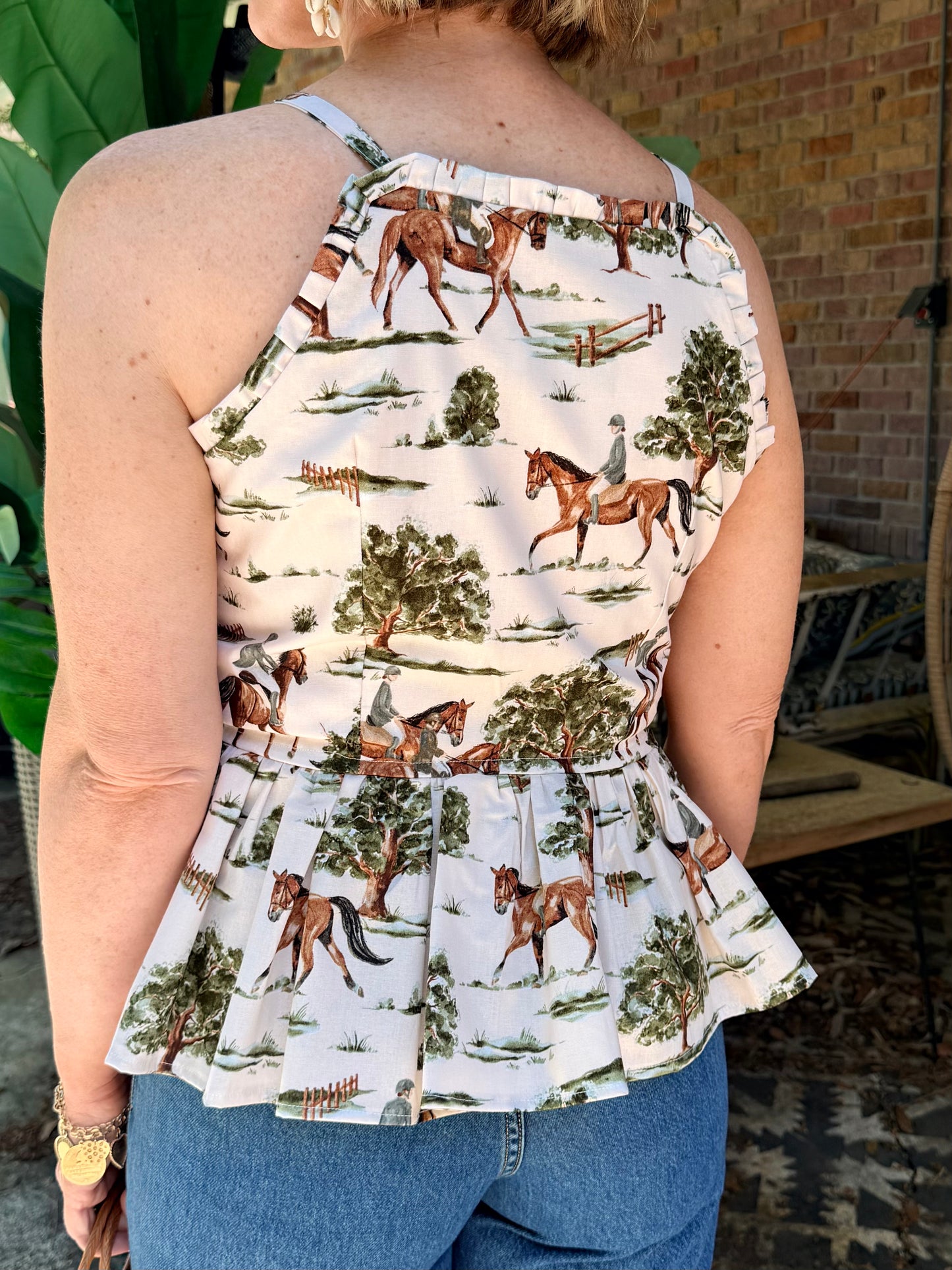 Moira Flounce Peplum Top in Horse Girl