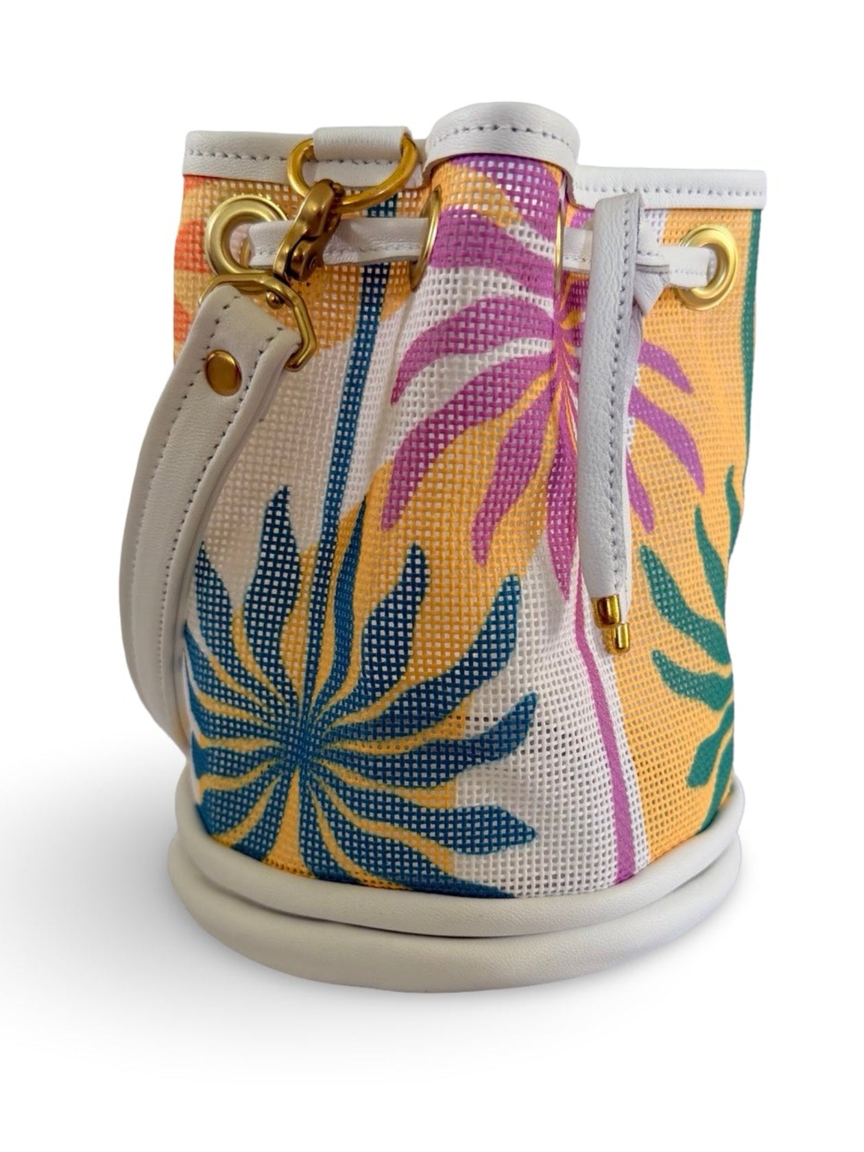 Miniature bucket bag with tropical leaf pattern on a white background